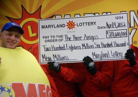 Photo of three amigos with lottery claim check